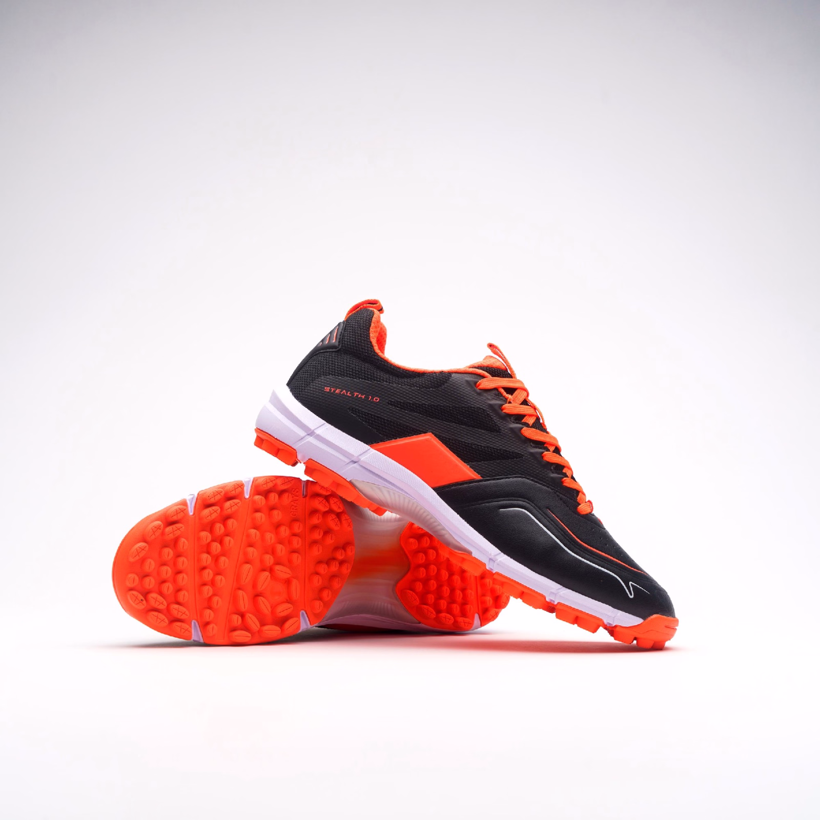 Grays Stealth 1.0 Hockey Shoes - Black/Orange (2024/25) - Grays Stealth 1.0 Hockey Shoes - Black/Orange (2024/25) - Grays Stealth 1.0 Hockey Shoes - Black/Orange (2024/25) - Grays Stealt